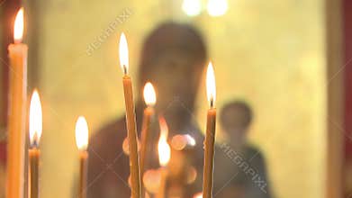 Wax candles in the Church burn.