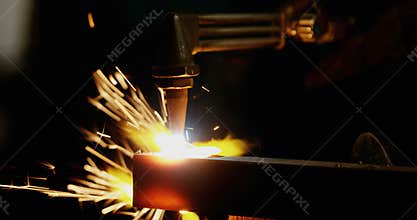Welder welding a metal