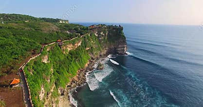 Uluwatu cliff aerial footage, Bali, Indonesia. Camera moves along the cliff