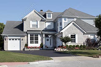 Brick house with blue siding