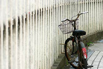 Lock the bicycle beside the fence