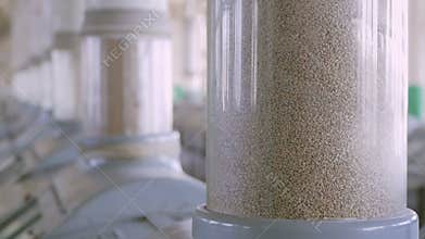 Manufacture of flour and cereals. Wheat milling. Production of wheat flour. Wheat flour milling equipment at the plant.