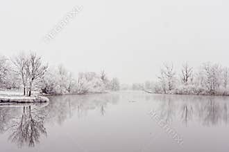 River landscape riparian area, white winter idyll