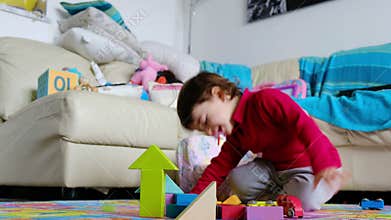 Angry baby fails at construction blocks game - reaction emotion management in childrens