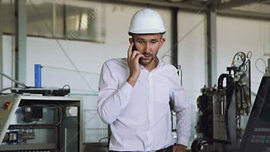 The angry manager speaking and crying on the phone in the factory 4K