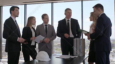Business meeting of architects and investors