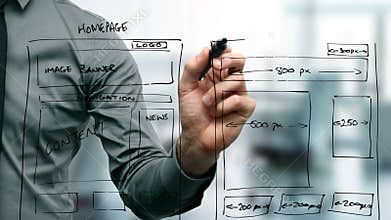 Web designer drawing website wireframe