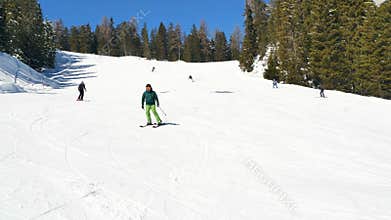 People having fun skiing winter holiday