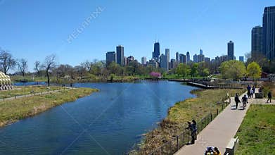 Families and couples strolling through Lincoln Park, Chicago, USA
