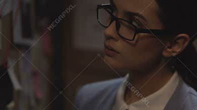 Smart specialist analyzing the carjacking crime case, making investigation plan