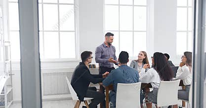 Group of business people having brainstorm meeting
