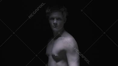 Ancient statue clenches his fist and disappears in the dark