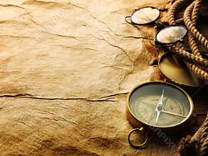 Compass, rope and glasses