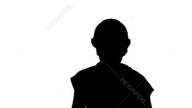 Silhouette Workers rally. Woman worker doing expresive gestures delivering speech.