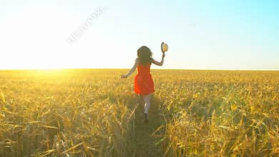 Happy traveler young hispanic beautiful woman running on wheat field in sunset summer. Freedom health happiness tourism