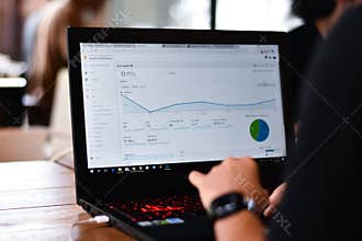 Webmaster view a report graph from Google Analytics.