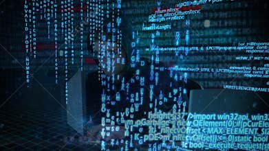 Hacker using computer in dark room