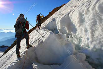 team doing a dangerous climbing