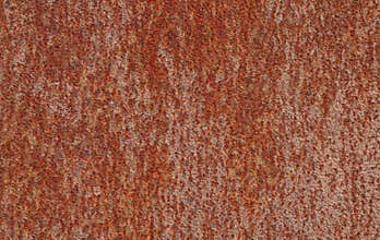 Old rusty sheet of metal. Uniform background texture of iron