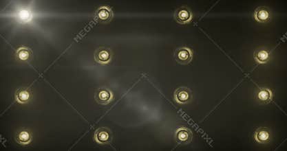 Flashing shiny yellow warm gold stage lights movement entertainment, spotlight projectors in the dark, warm soft light spotlight