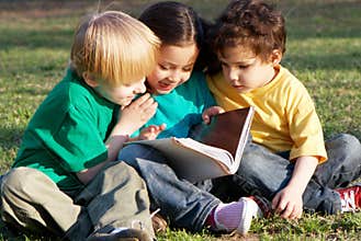 Group of children with the book