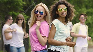 Summer camp, best friends dancing and laughing at party, happiness and youth