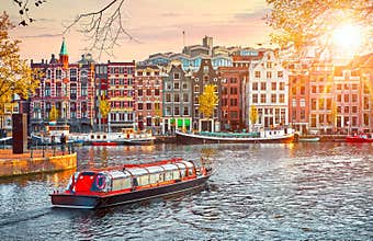 Channel in Amsterdam Netherlands houses river Amstel