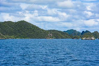 Barren chalk hills, sailer, Indonesia
