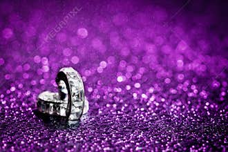 Diamond in purple water drops