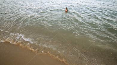 Happy Girl Enjoying the Sea