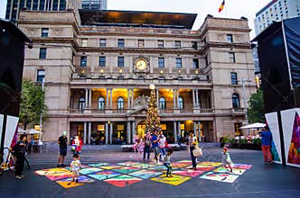 Christmas projections animated on the ground at Customs House Square produced by the City of Sydney.