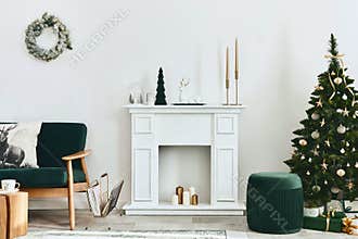 Stylish christmas living room interior with green sofa, white chimney, christmas tree and wreath, gifts and decoration. Santa.