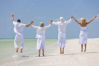People Seniors Family Generations Jumping on Beach