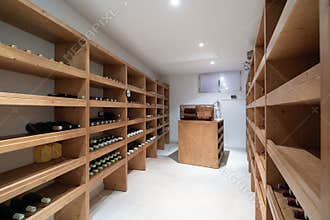 Wine cellar with bottles and cigar humidifier
