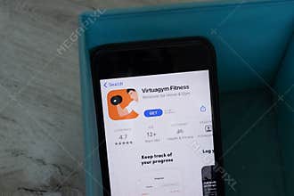 New York, USA - 1 June 2021: Virtuagym Fitness mobile app logo on phone screen, close-up icon, Illustrative Editorial