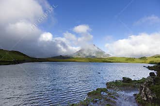 Lagoa Do Capitao with Pico mountain in the background, Pico island, Azores