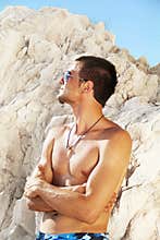 Handsome Caucasian fit man in beach