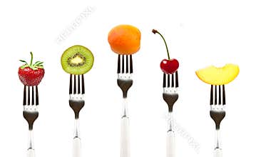 Raw Food. Fruits on forks