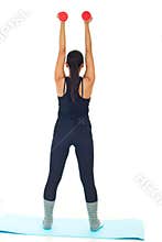 Back of woman lifting barbell