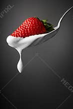 Dripping cream and strawberry