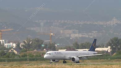 Airbus A321 of Air Astana take off