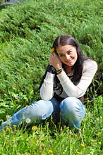 Woman relaxing in field