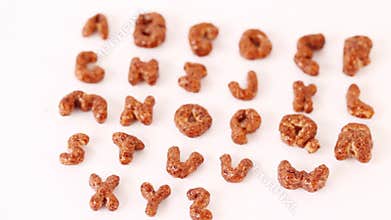 Alphabet letters from cereals on white