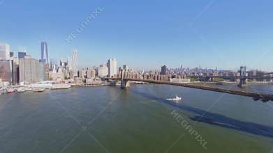 City traffic on Brooklyn Bridge over East River at