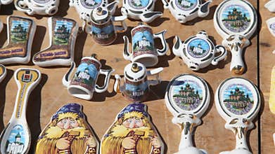 Magnets on refrigerator in form of spoons, boot,