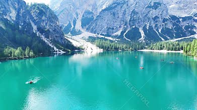 Boats on an afternoon on Lake Braise by the Dolomites in Trentino Alto Adige.