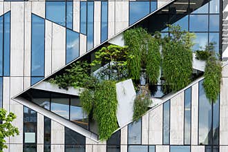 Space for nature with plants and trees in facade of Koe-Bogen in Dusseldorf. Modern high-rise building by star architect Libeskind