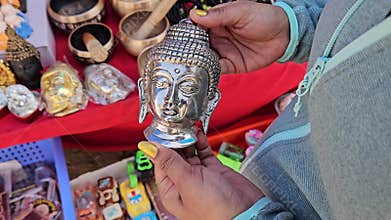 Spiritual Finds: Gautam Buddha Artifacts on Sale in a Dharamshala Market Shop