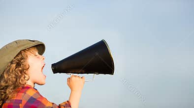 Kid shouting through megaphone