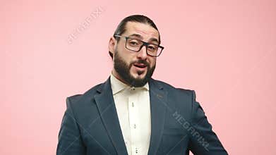 Confused businessman in blue suit unhappy with situation